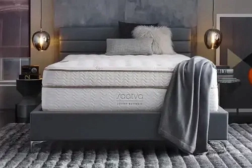 saatva mattress on bed